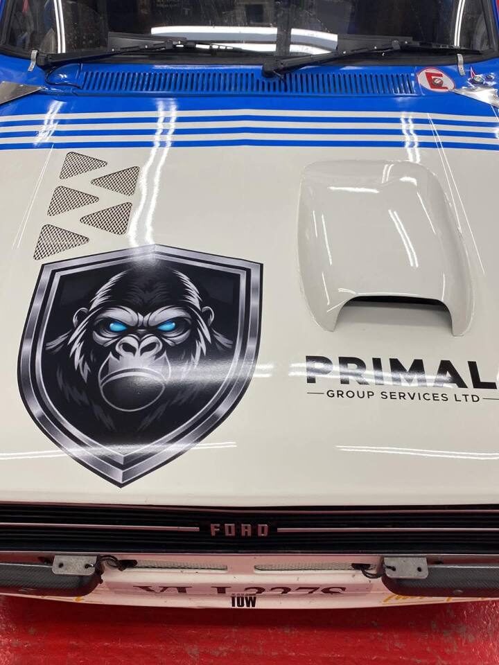 Primal-sponsored rally car bonnet with Primal Group Services Ltd branding